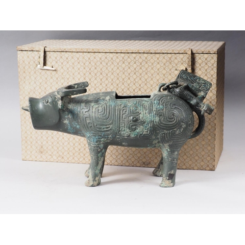 101 - A Chinese bronze limited edition ritual vessel, formed as a water buffalo with engraved archaic deco... 