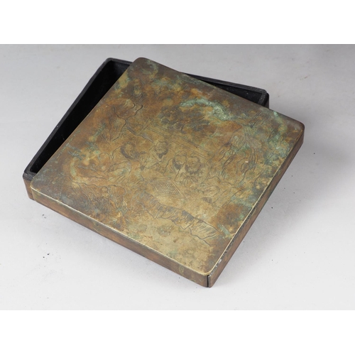 108 - A Chinese brass ink box with engraved decoration, 7 3/4