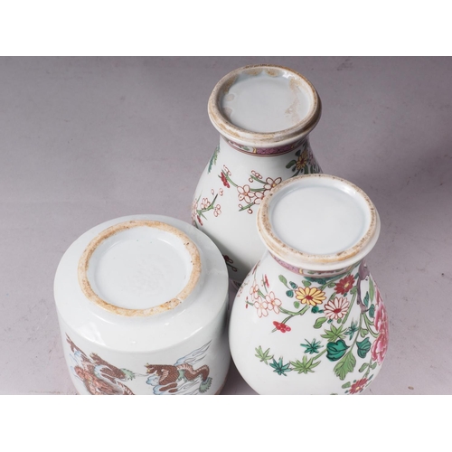 113 - A pair of Chinese porcelain famille rose floral decorated oviform vases, 7