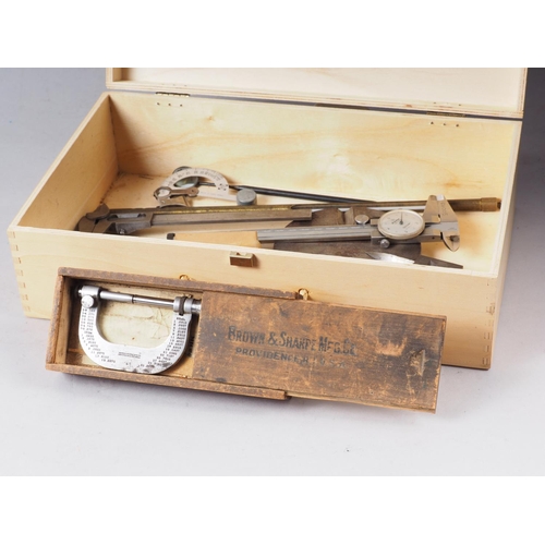 128 - A Mitutoyo vernier gauge, two other gauges, a micrometer, a Brown & Sharpe micrometer, thermometer, ... 