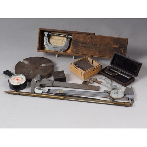 128 - A Mitutoyo vernier gauge, two other gauges, a micrometer, a Brown & Sharpe micrometer, thermometer, ... 