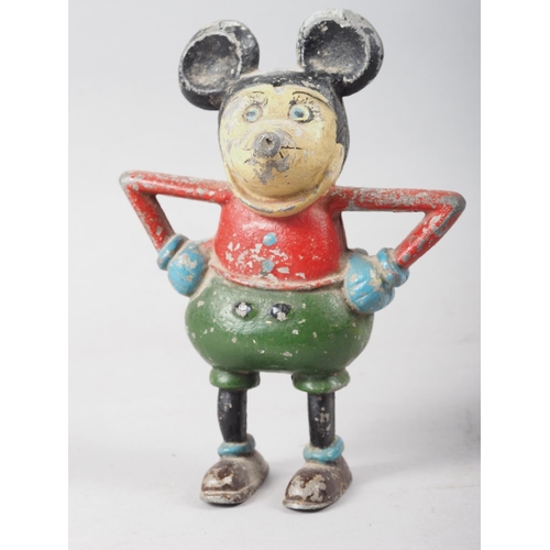 143 - A 1930s French painted aluminium Mickey Mouse/Steamboat Willie money box/still bank, 8