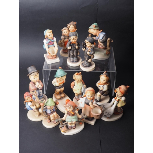 65 - Fourteen Goebel Hummel figures, and a quantity of  drinking glasses