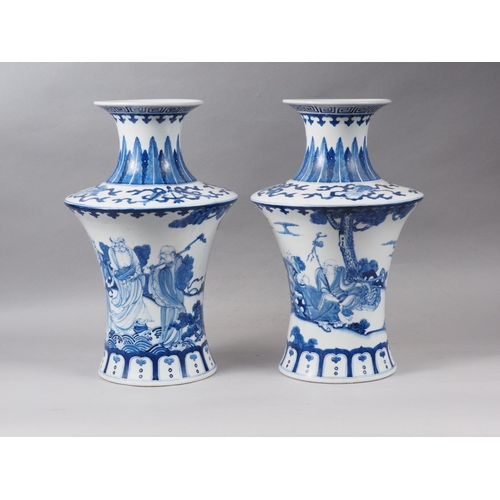 67 - A pair of Chinese blue and white flared vases with figures in a landscape decoration, 16