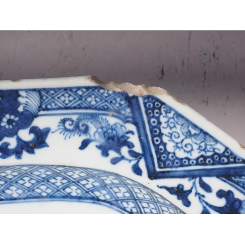 75 - A Chinese blue and white platter, decorated birds, a tree and a fence, 16 1/2