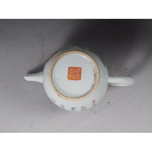 77 - A Chinese teapot, decorated various verses, with cover formed as a saucer, 3 1/4