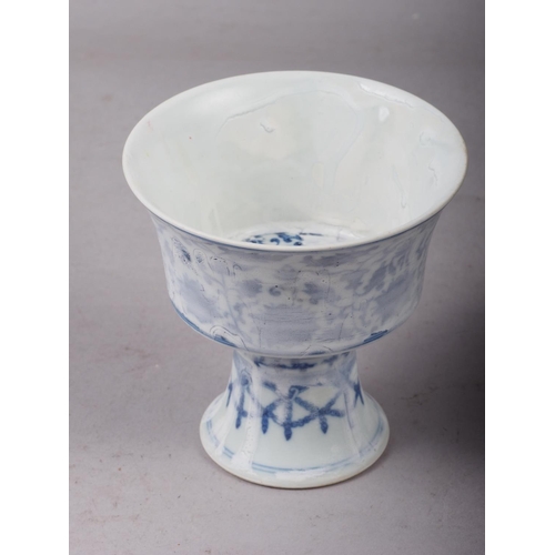 84 - A Chinese porcelain blue and white stem cup with faulty glaze, 4 1/8