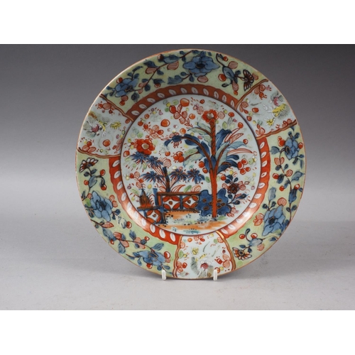 87 - A Chinese polychrome plate with tree and fence design, 9 1/4