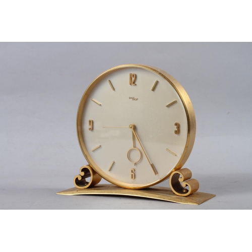 121 - An Imhof 1960 gilt cased mantel clock with alarm movement, 7