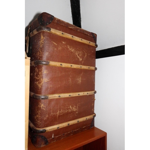 547 - A canvas and wood bound travel trunk