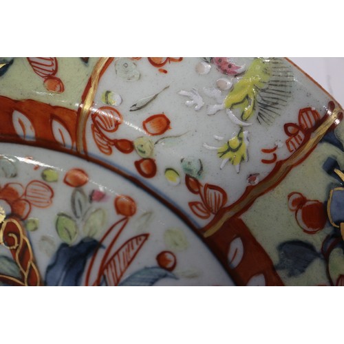 87 - A Chinese polychrome plate with tree and fence design, 9 1/4