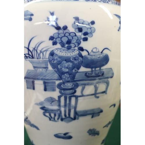 99 - A Chinese porcelain blue and white baluster vase, decorated precious objects, 16