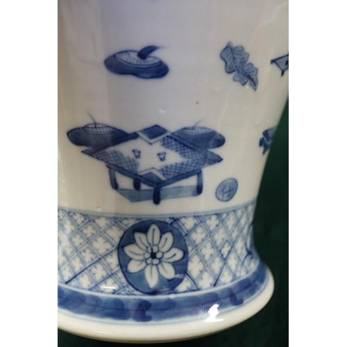 99 - A Chinese porcelain blue and white baluster vase, decorated precious objects, 16