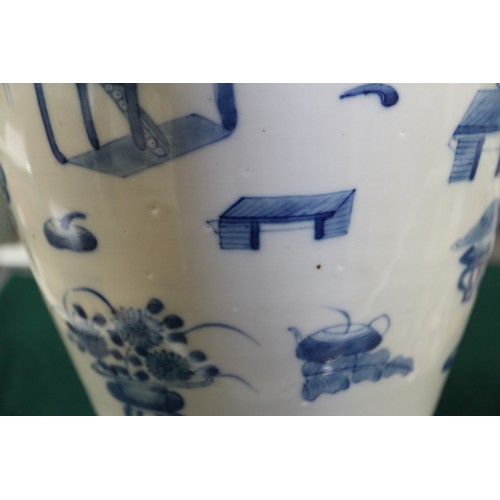 99 - A Chinese porcelain blue and white baluster vase, decorated precious objects, 16