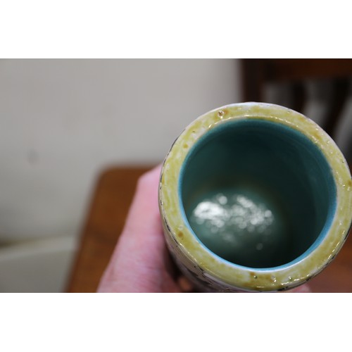 96 - A Chinese cylindrical brush pot, decorated dragon amongst clouds with flaming pearl 4 1/8