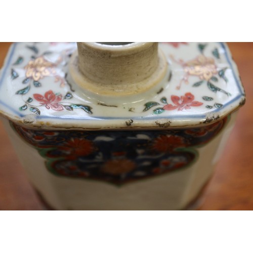 73 - A Chinese famille rose bowl with floral and scrolled polychrome decoration and six character mark to... 