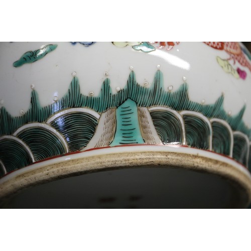 76 - A Chinese famille verte bulbous vase with polychrome dragon and cloud decoration, four character mar... 