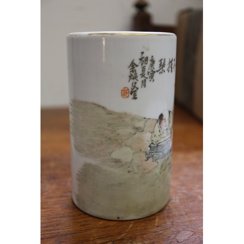 72 - A Chinese brush pot, decorated figures in a landscape and verse, 4 3/4