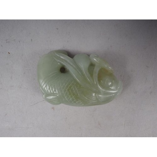 91 - A Chinese carved jade fish, 2 1/2