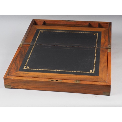 151 - A walnut and brass mounted writing box with fitted interior, 16