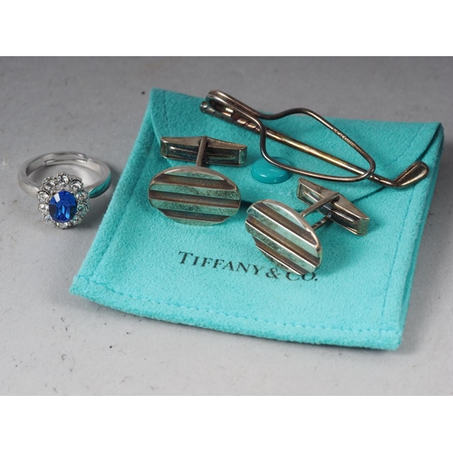 286 - A pair of Tiffany & Co silver cufflinks, a Tiffany & Co silver golf club tie clip and a Swarovski dr... 