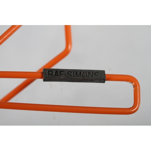 302 - R A F Simons: an orange wire work brooch, 4