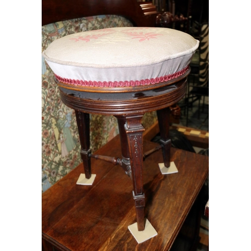 417 - A 19th century carved walnut piano stool with adjustable seats, on three square taper supports, a po... 