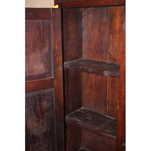 437 - A 19th century oak dresser, the upper section fitted open shelves and cupboards enclosed panelled do... 