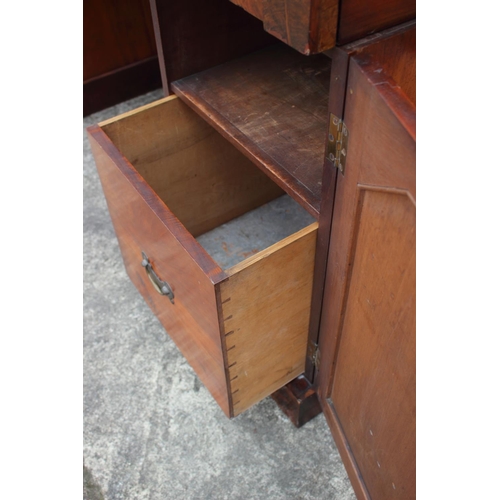 438 - A 19th century mahogany ledge back double pedestal sideboard, fitted three drawers over cupboards, o... 