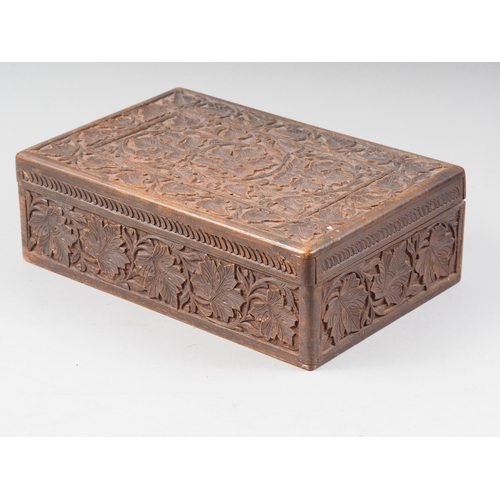 100 - An Oriental carved hardwood box, 12