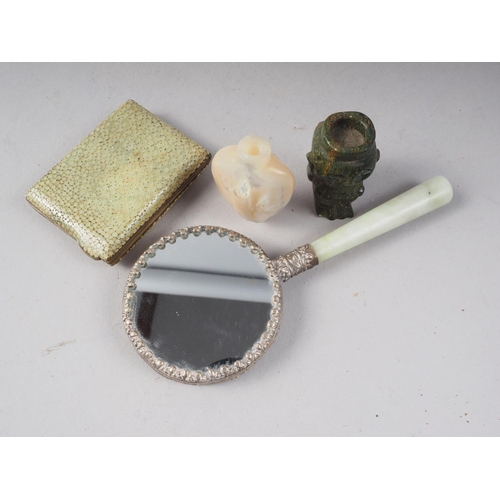 102 - A Chinese carved jade and white metal mounted hand mirror, a carved mother-of-pearl snuff bottle wit... 