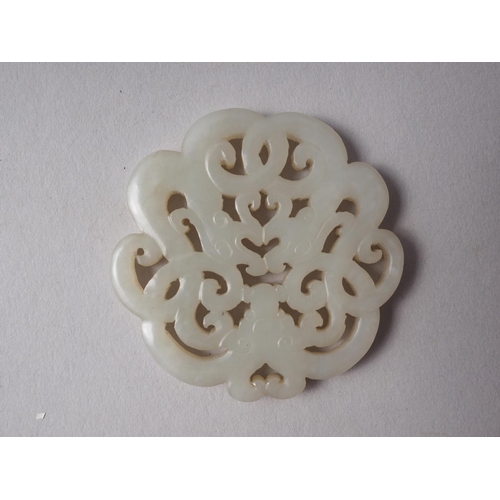 113 - A phoenix carved jade panel, 2 3/4