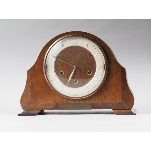 116 - An Art Deco walnut cased mantel clock with three train movement, 9