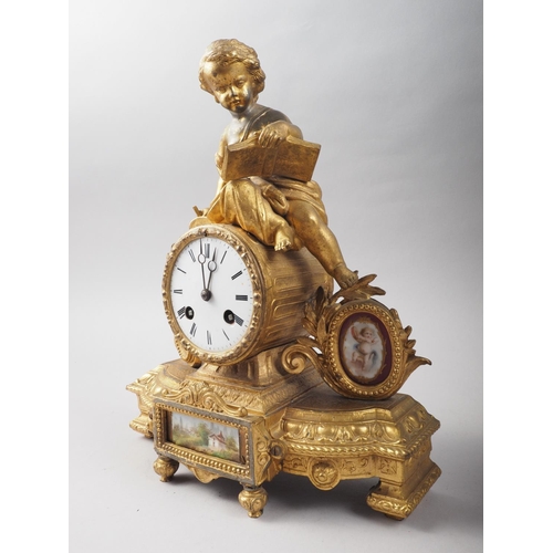 119 - An 19th century French gilt brass mantel clock with putto surmount and flanking porcelain panels, 12... 