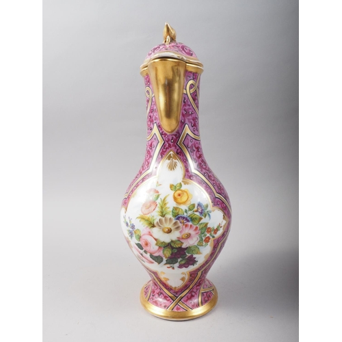 12 - An early 19th century Continental porcelain jug with gilt metal mounts and floral reserved panel on ... 