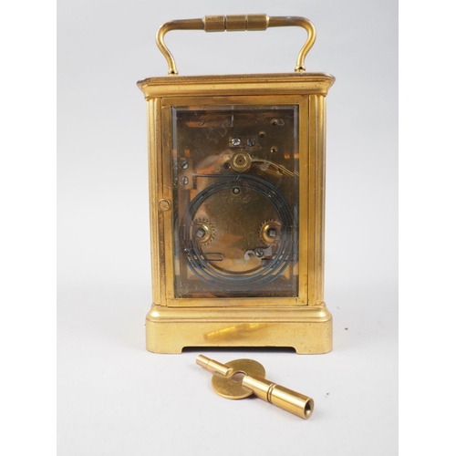 126 - A gilt metal cased hour repeater carriage clock, 5 1/2