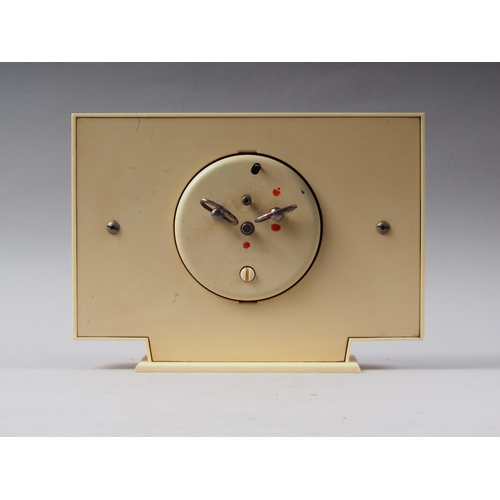 128 - A 1930s Jaz cream plastic alarm clock, 6 1/2