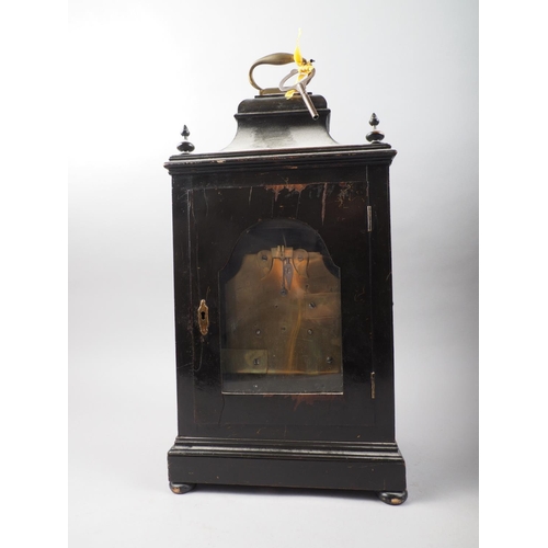 130 - A late 18th century bracket clock with painted arch top dial and eight-day movement, by William Hitc... 