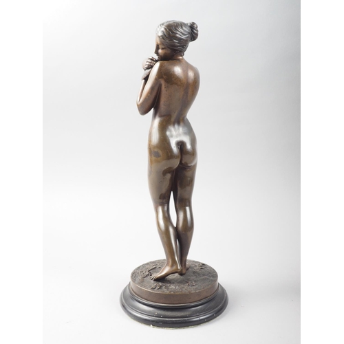 137 - After Charles Augste Fraikin - A patinated bronze of Venus a la Colombe, 12 1/4