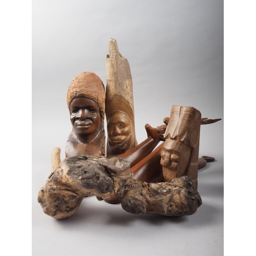 148 - Two African carved busts, taller 10 1/2