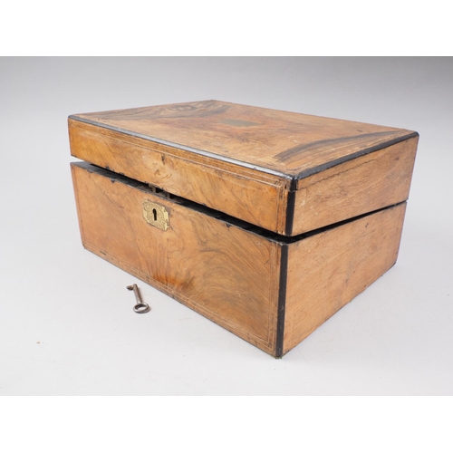 151 - A walnut and brass mounted writing box with fitted interior, 16