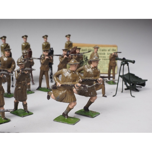 165 - A collection of early 20th  century  Britains painted lead soldiers (30 approx) and a field gun