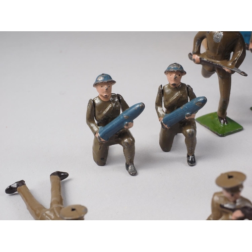 165 - A collection of early 20th  century  Britains painted lead soldiers (30 approx) and a field gun