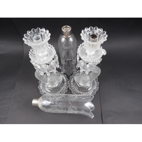 18 - A pair of Baccarat glass candlesticks with frosted dolphin stems, cut glass drops and engraved glass... 