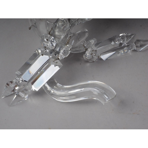 19 - A Baccarat three-light candelabra with frosted putto support, 21 1/2