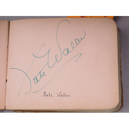 211 - An autograph book, reputedly containing autographs from Max Miller, Mary Ellis, Arthur Askey and man... 