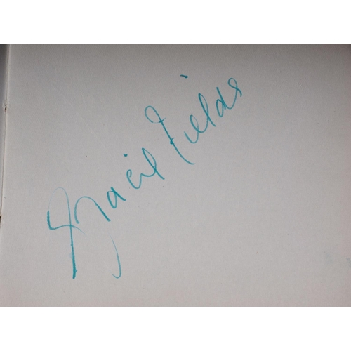 211 - An autograph book, reputedly containing autographs from Max Miller, Mary Ellis, Arthur Askey and man... 