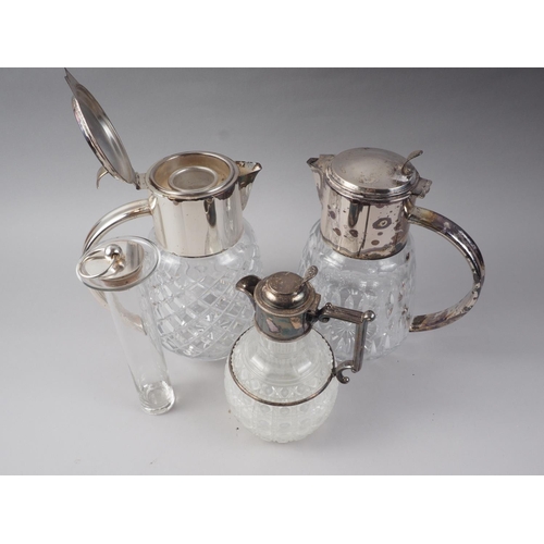 215 - Two cut glass and silver plate mounted Pimm's jugs and a smaller similar hobnail cut claret jug with... 