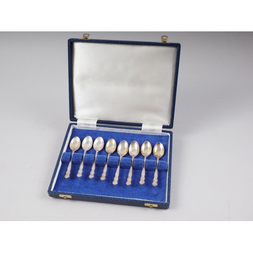 277 - A cased set of eight silver coffee spoons and a cased set of six silver teaspoons and matching sugar... 