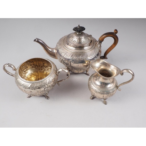 278 - A Victorian silver three-piece teaset with embossed ribbon and swag decoration, 27oz troy approx